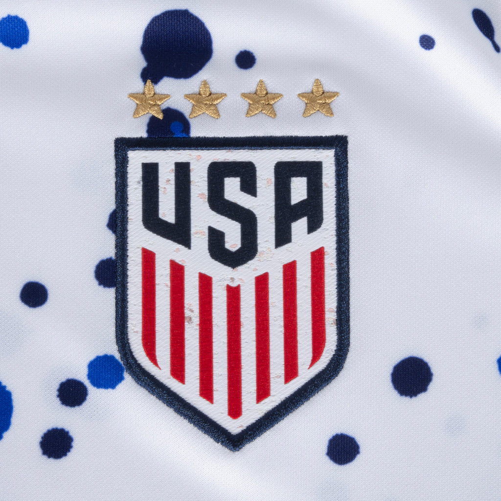 USA crest with four gold stars